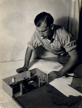 Eero Saarinen with A Combined Living-Dining-Room-Study project Model, Circa 1937