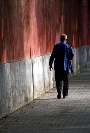 Old man walking in the street