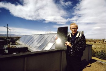 George Löf, designer and engineer with glass plate used in solar collectors. House of George Löf, Denver, Colorado, 1975_Jon Naar