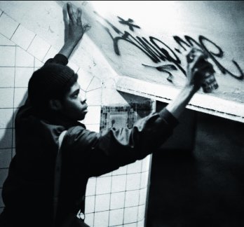 Flip One Spraying his name in New York City’s underground subway system, 1974_Flint Gennari